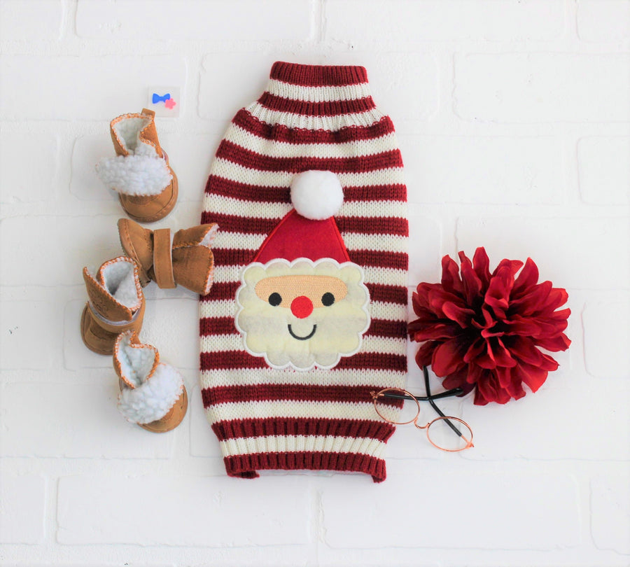 Red Dog Sweater for Christmas with Santa face, flat lay showing felt design on knitted sweater