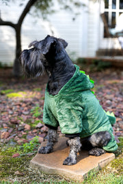 dog costume, sitting Schnauzer side view color is green