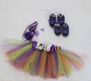flat lay of pet tutu with dog accessories